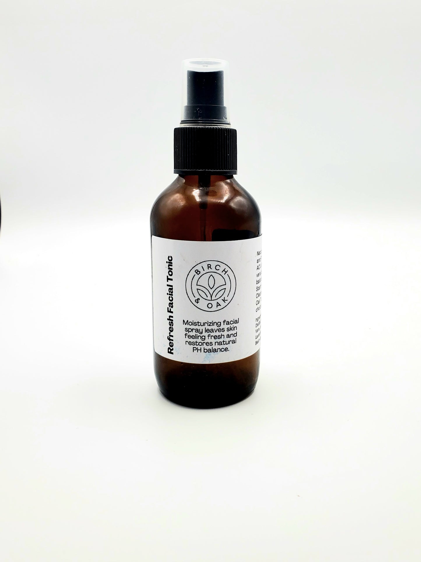 Brown bottle with a white label on a white background