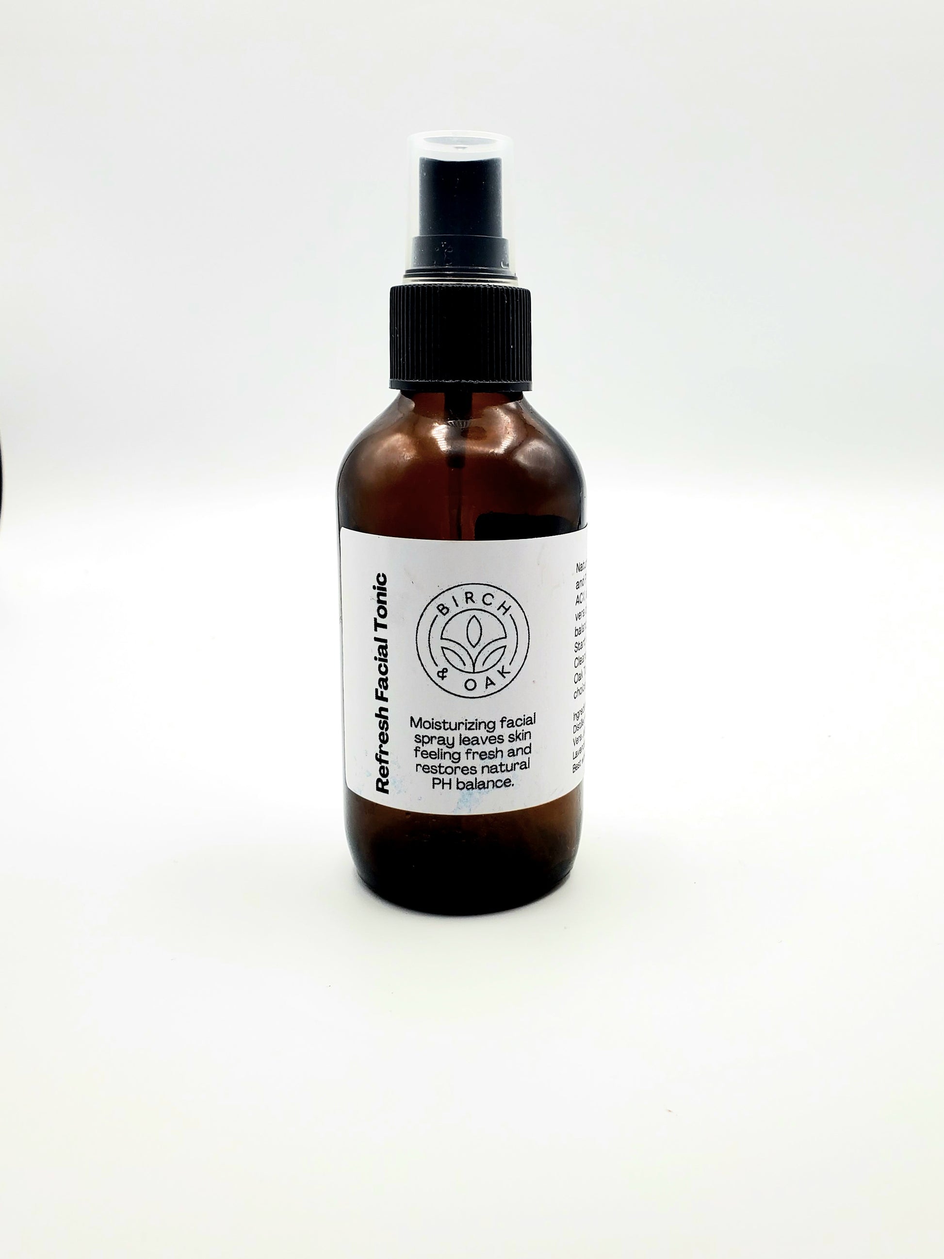Brown bottle with a white label on a white background