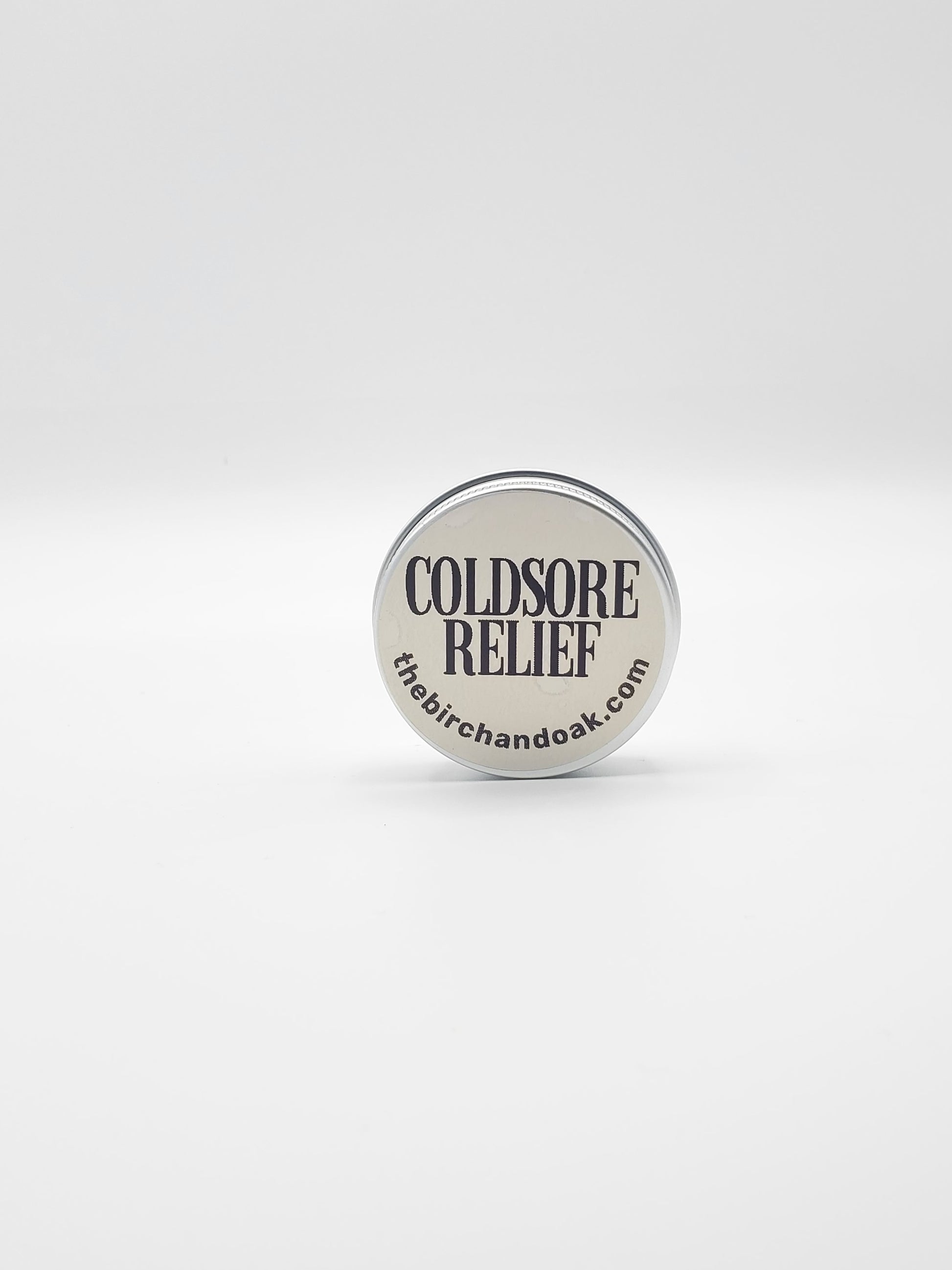 Coldsore relief product with 'thebirchanddak.com' branding on a white background